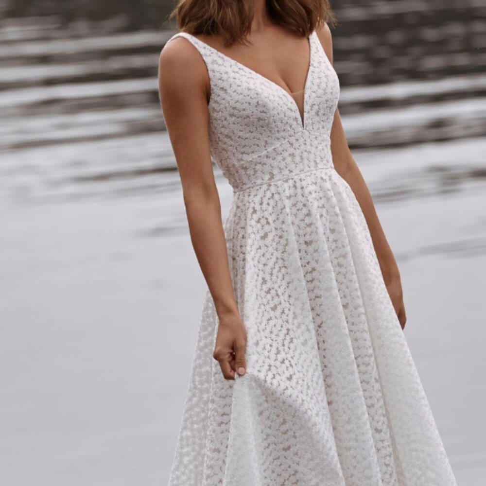 Wedding Dress (Madi Lane Bridal) ~ size 12 (Never worn) with slight alterations.